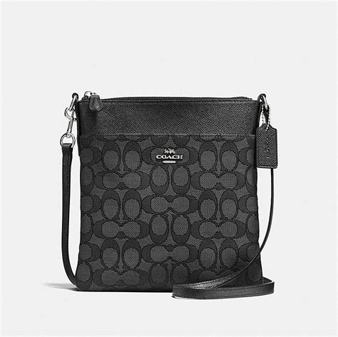 Coach kitt messenger crossbody - 4. VIEW ALL REVIEWS. Crafted of polished pebble leather featuring a cheerful cherry print, the Kitt Messenger is a versatile crossbody perfect for weekends or travel. An exterior pocket gives easy access to essentials.